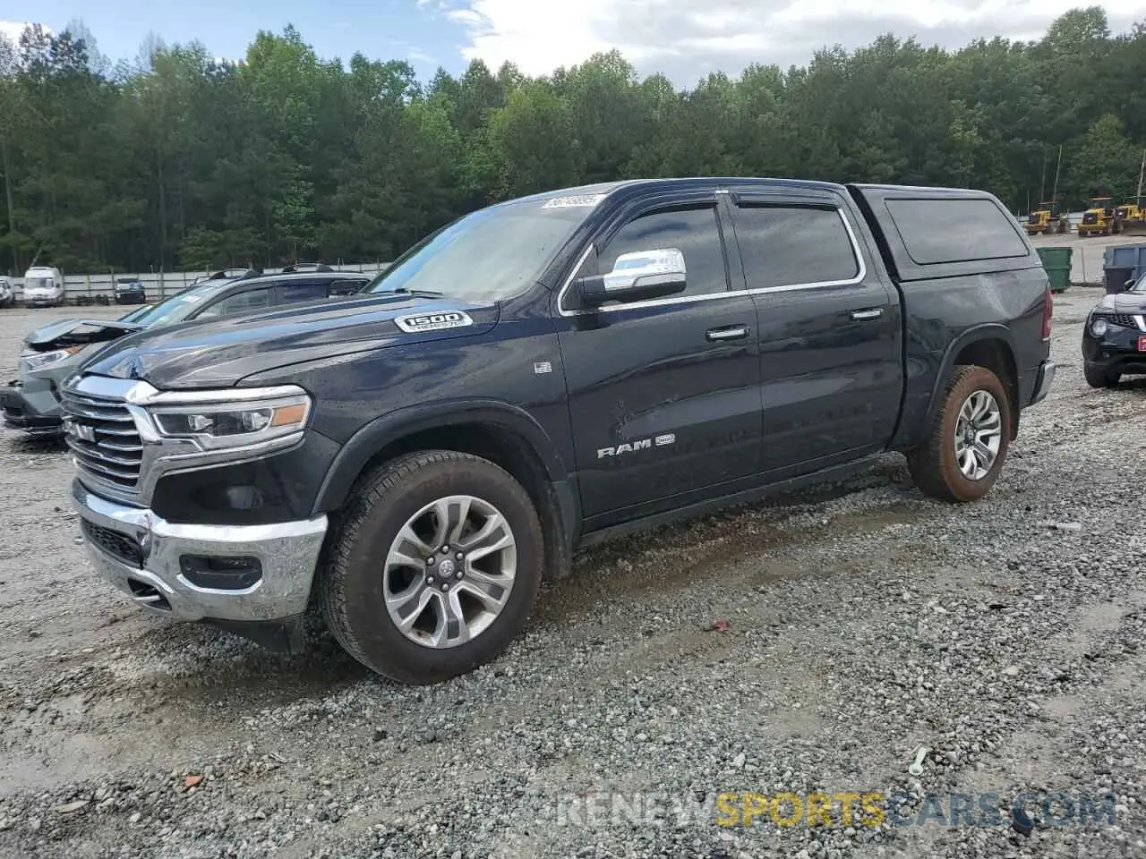 1 Photograph of a damaged car 1C6SRFKT2KN764471 RAM 1500 2019