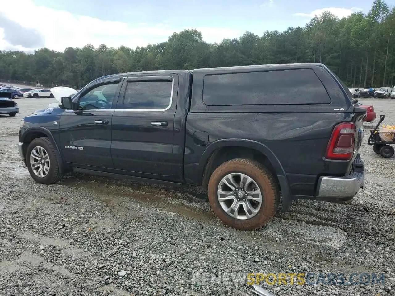 2 Photograph of a damaged car 1C6SRFKT2KN764471 RAM 1500 2019