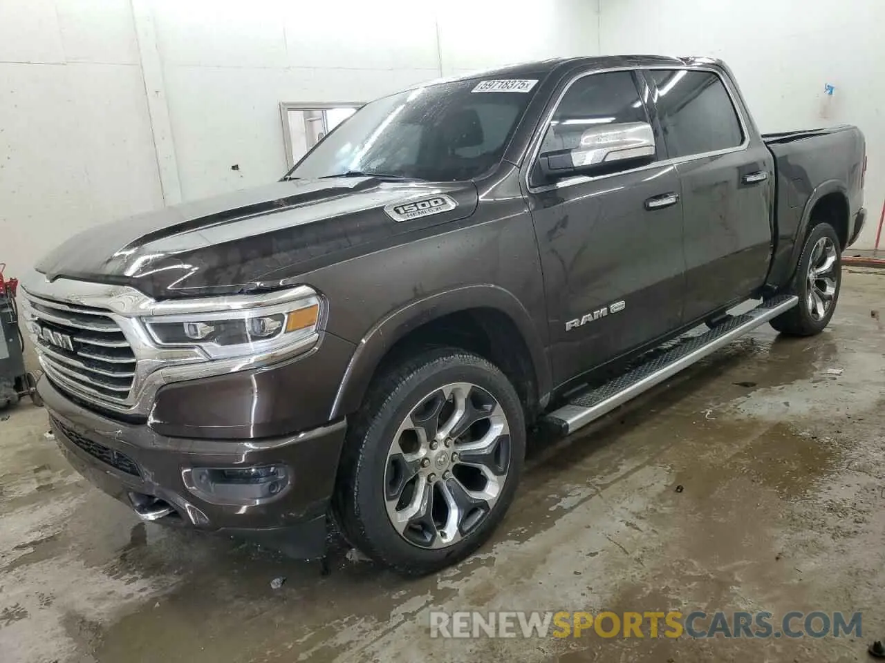 1 Photograph of a damaged car 1C6SRFKT3KN778279 RAM 1500 2019