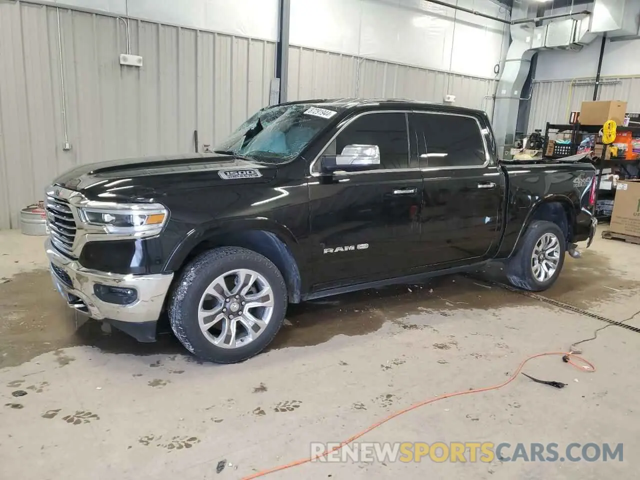 1 Photograph of a damaged car 1C6SRFKT6KN717881 RAM 1500 2019