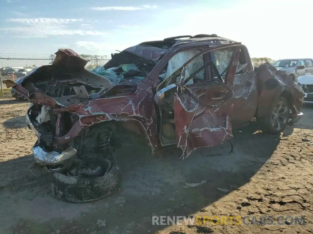 1 Photograph of a damaged car 1C6SRFKT7KN544730 RAM 1500 2019