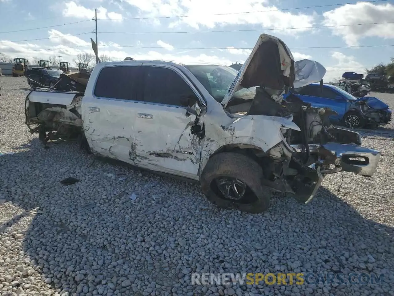 4 Photograph of a damaged car 1C6SRFKT9KN627799 RAM 1500 2019
