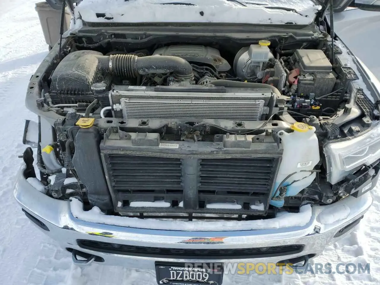 11 Photograph of a damaged car 1C6SRFKT9KN830899 RAM 1500 2019