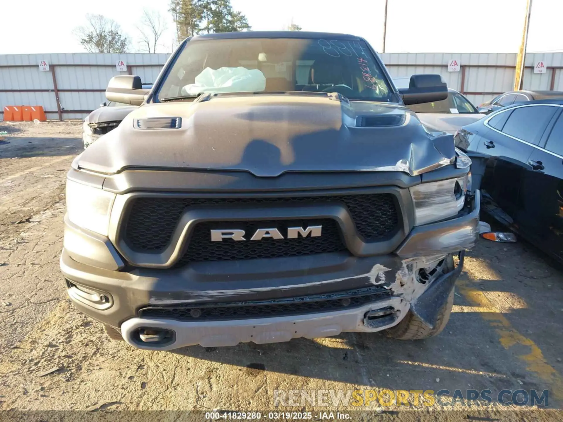 12 Photograph of a damaged car 1C6SRFLT0KN688814 RAM 1500 2019