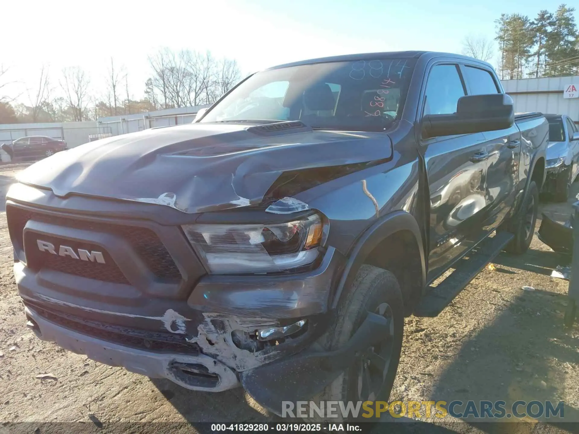 2 Photograph of a damaged car 1C6SRFLT0KN688814 RAM 1500 2019