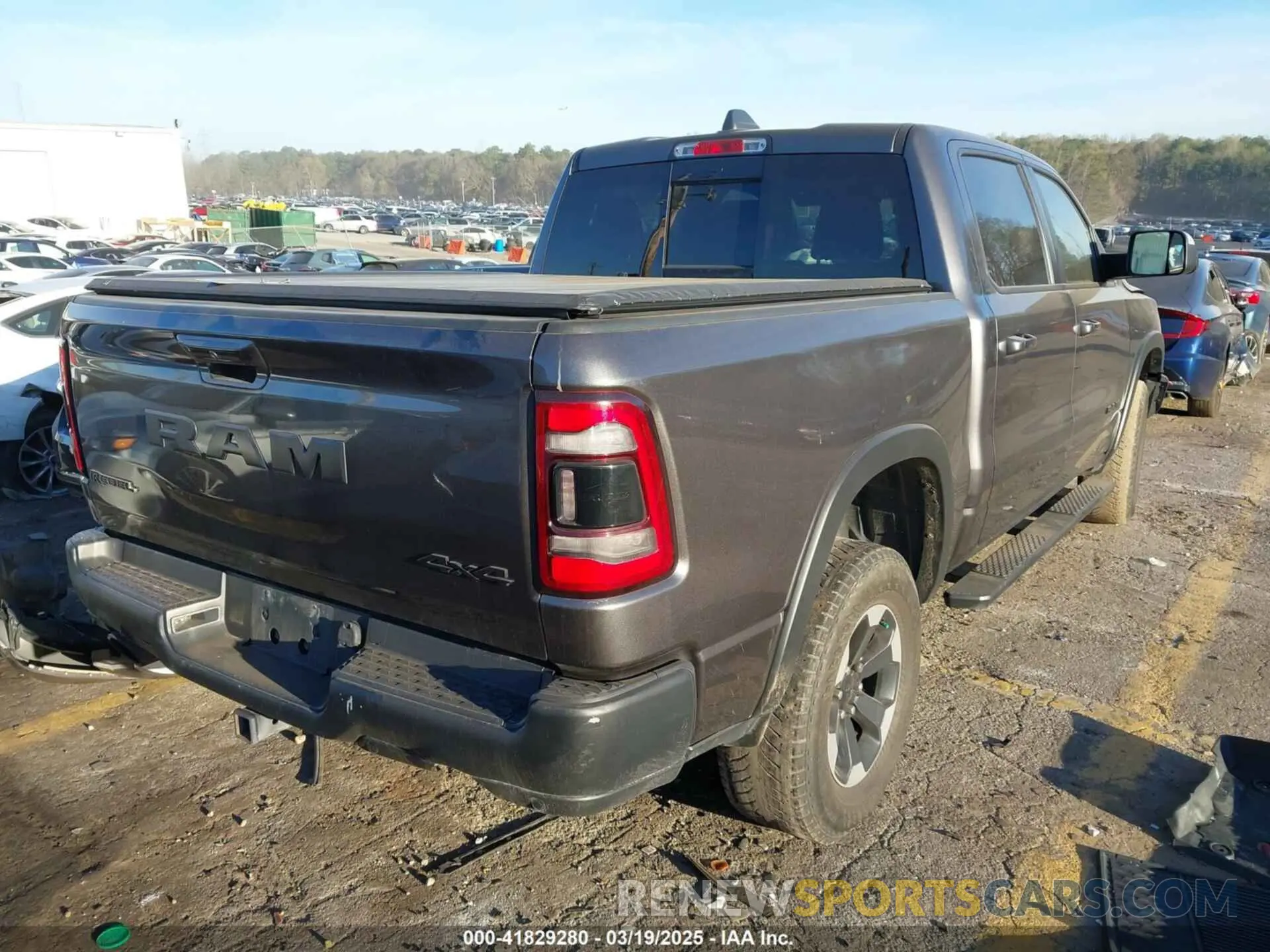 4 Photograph of a damaged car 1C6SRFLT0KN688814 RAM 1500 2019