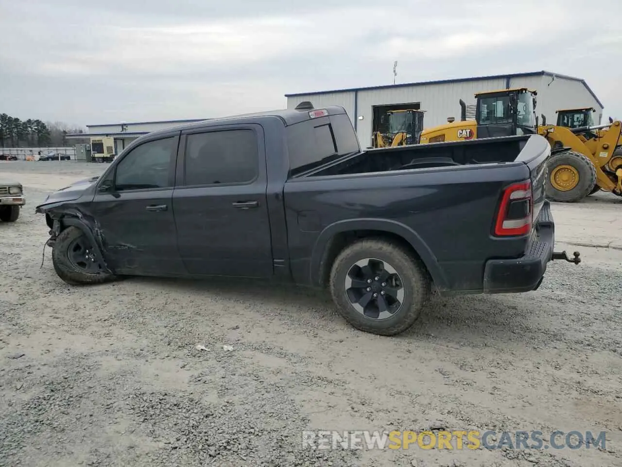 2 Photograph of a damaged car 1C6SRFLT0KN844950 RAM 1500 2019