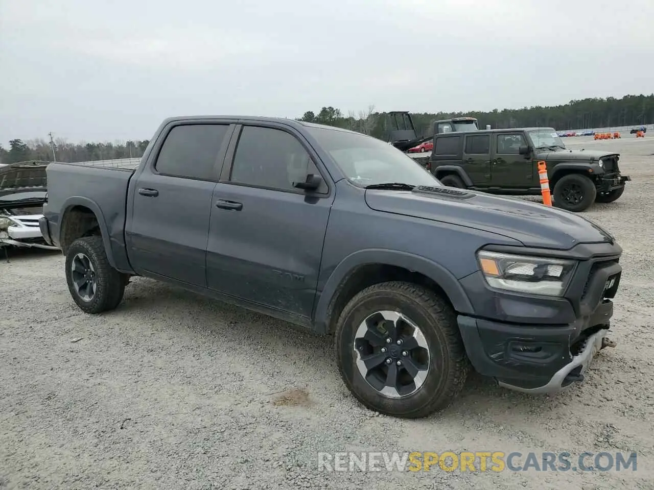 4 Photograph of a damaged car 1C6SRFLT0KN844950 RAM 1500 2019