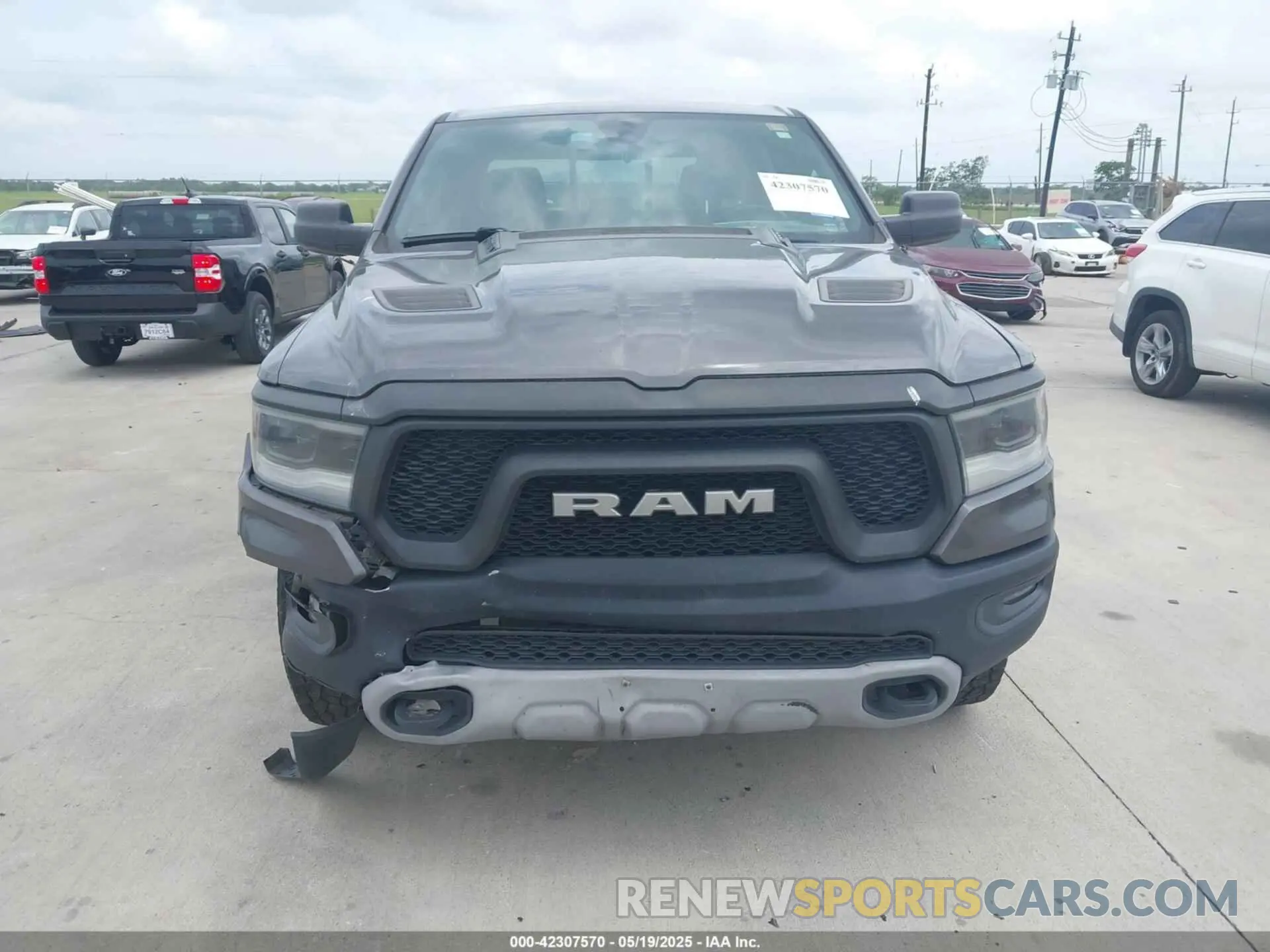 12 Photograph of a damaged car 1C6SRFLT0KN845113 RAM 1500 2019