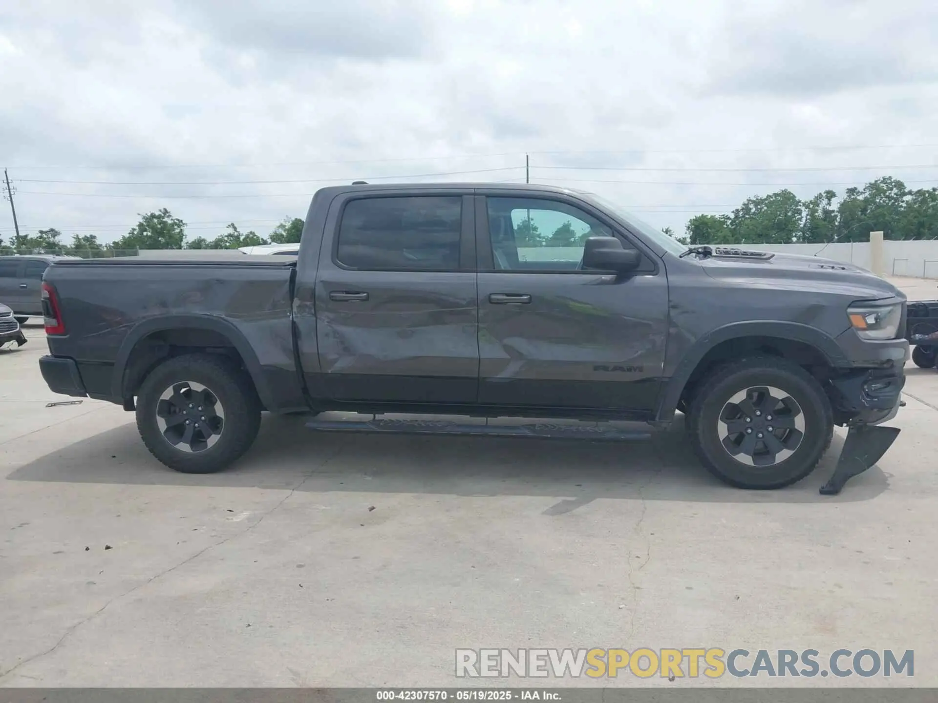 13 Photograph of a damaged car 1C6SRFLT0KN845113 RAM 1500 2019