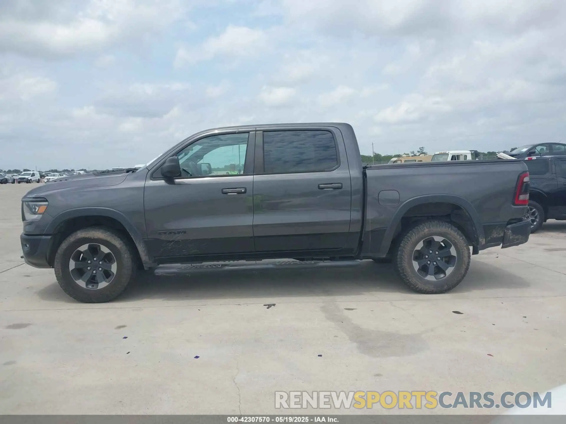 14 Photograph of a damaged car 1C6SRFLT0KN845113 RAM 1500 2019