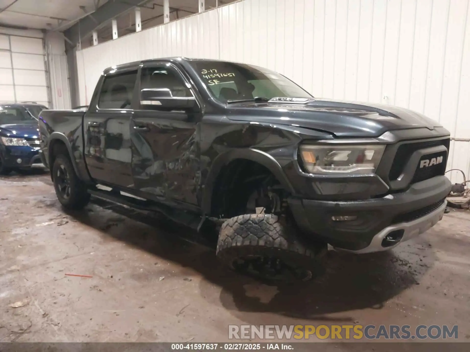 1 Photograph of a damaged car 1C6SRFLT0KN897440 RAM 1500 2019