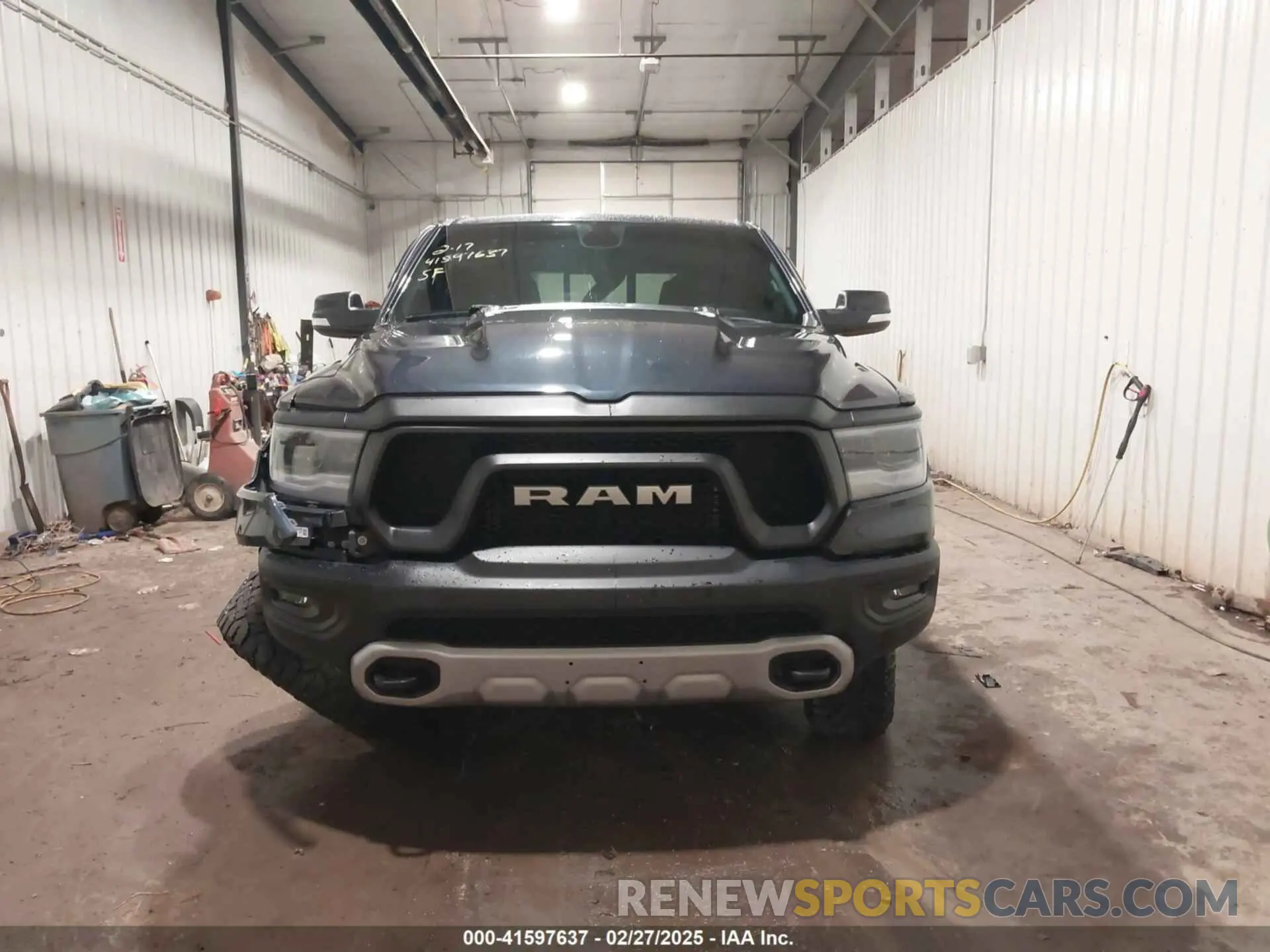 13 Photograph of a damaged car 1C6SRFLT0KN897440 RAM 1500 2019