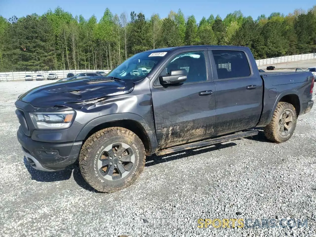 1 Photograph of a damaged car 1C6SRFLT0KN913894 RAM 1500 2019