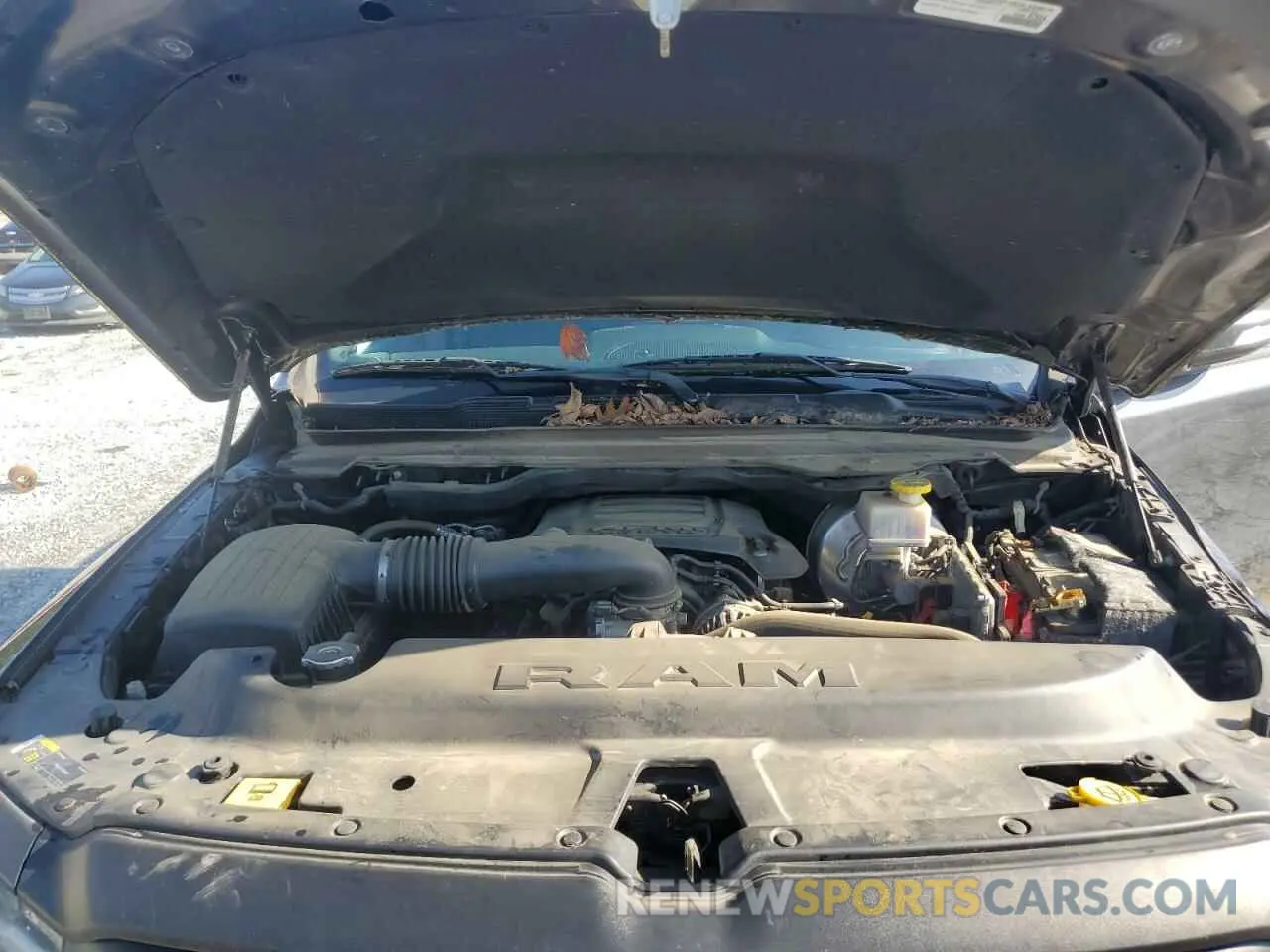 13 Photograph of a damaged car 1C6SRFLT0KN913894 RAM 1500 2019
