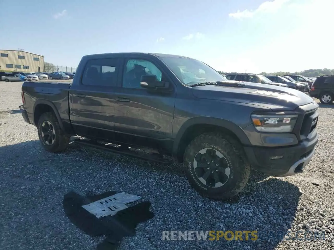 4 Photograph of a damaged car 1C6SRFLT0KN913894 RAM 1500 2019