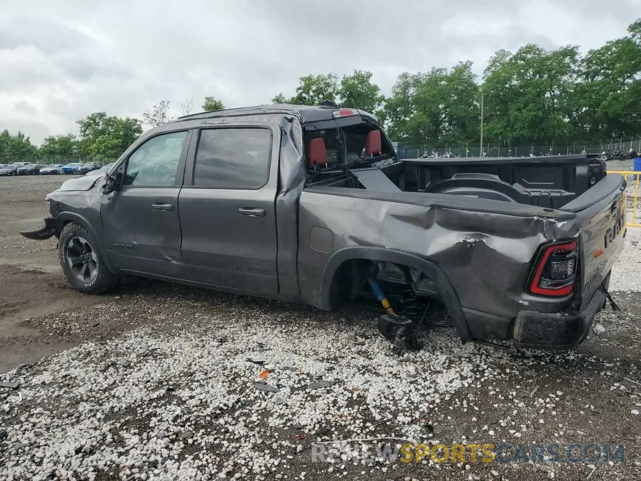 2 Photograph of a damaged car 1C6SRFLT1KN550716 RAM 1500 2019