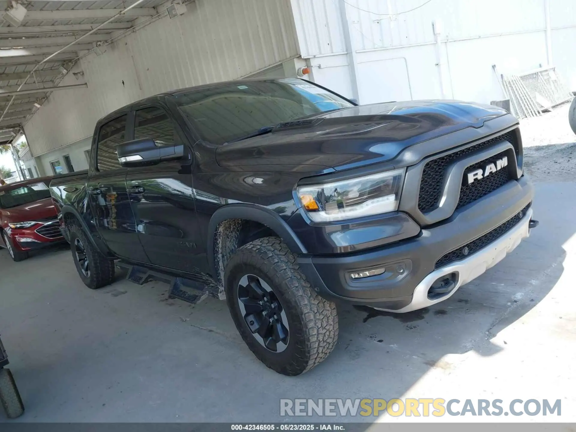 13 Photograph of a damaged car 1C6SRFLT1KN560260 RAM 1500 2019