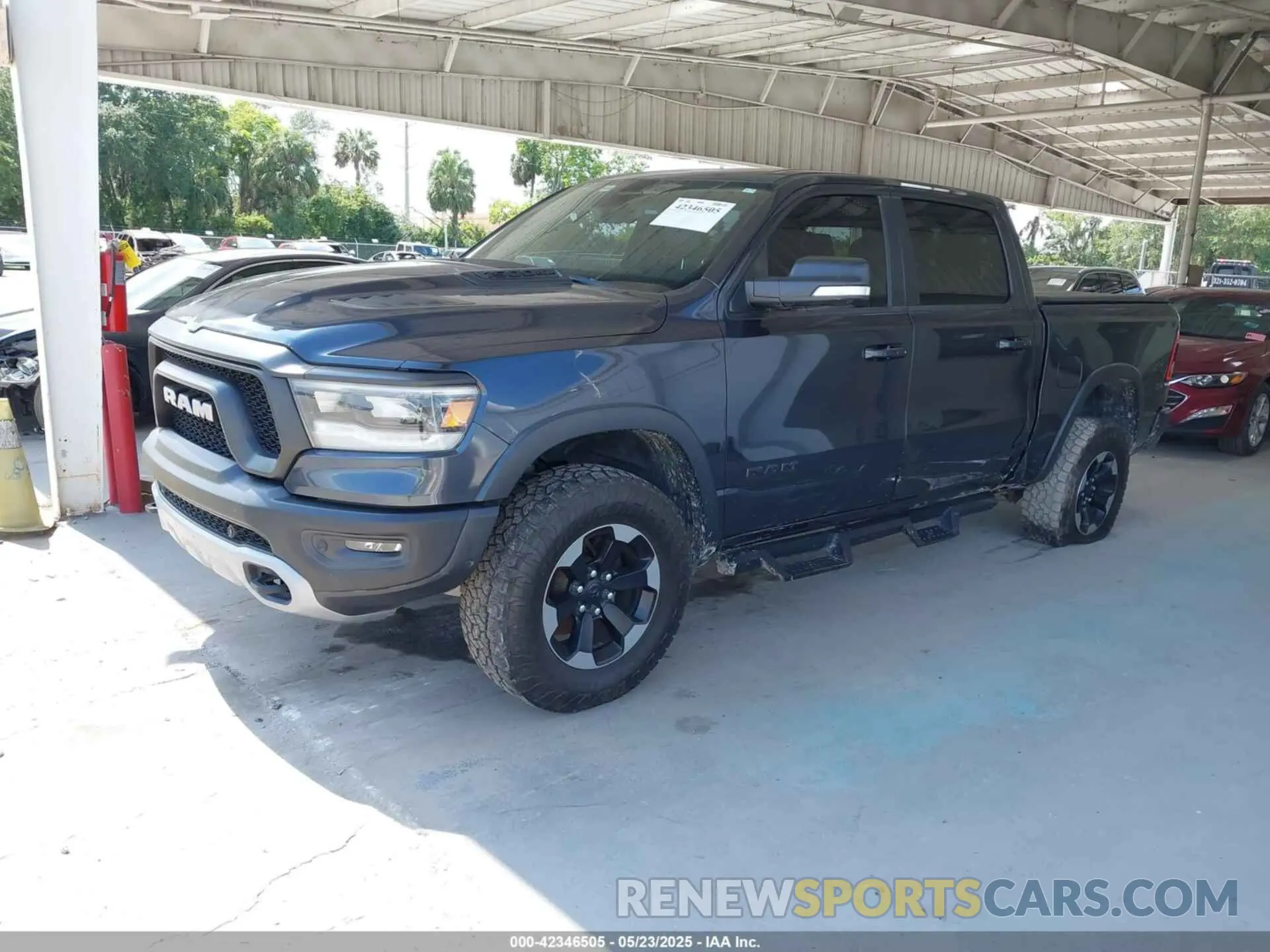 2 Photograph of a damaged car 1C6SRFLT1KN560260 RAM 1500 2019