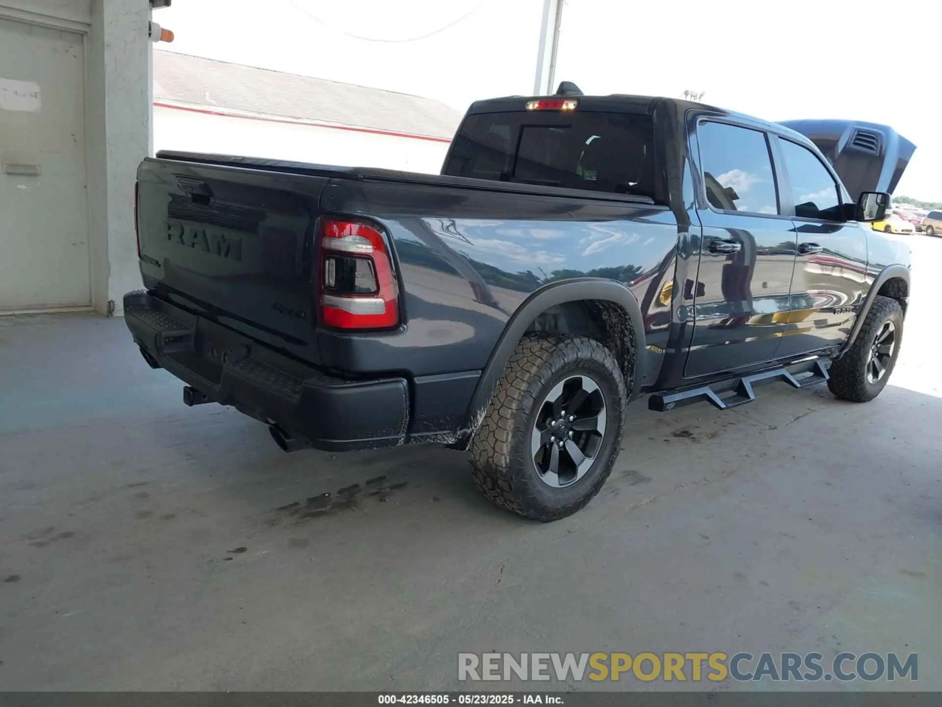 4 Photograph of a damaged car 1C6SRFLT1KN560260 RAM 1500 2019