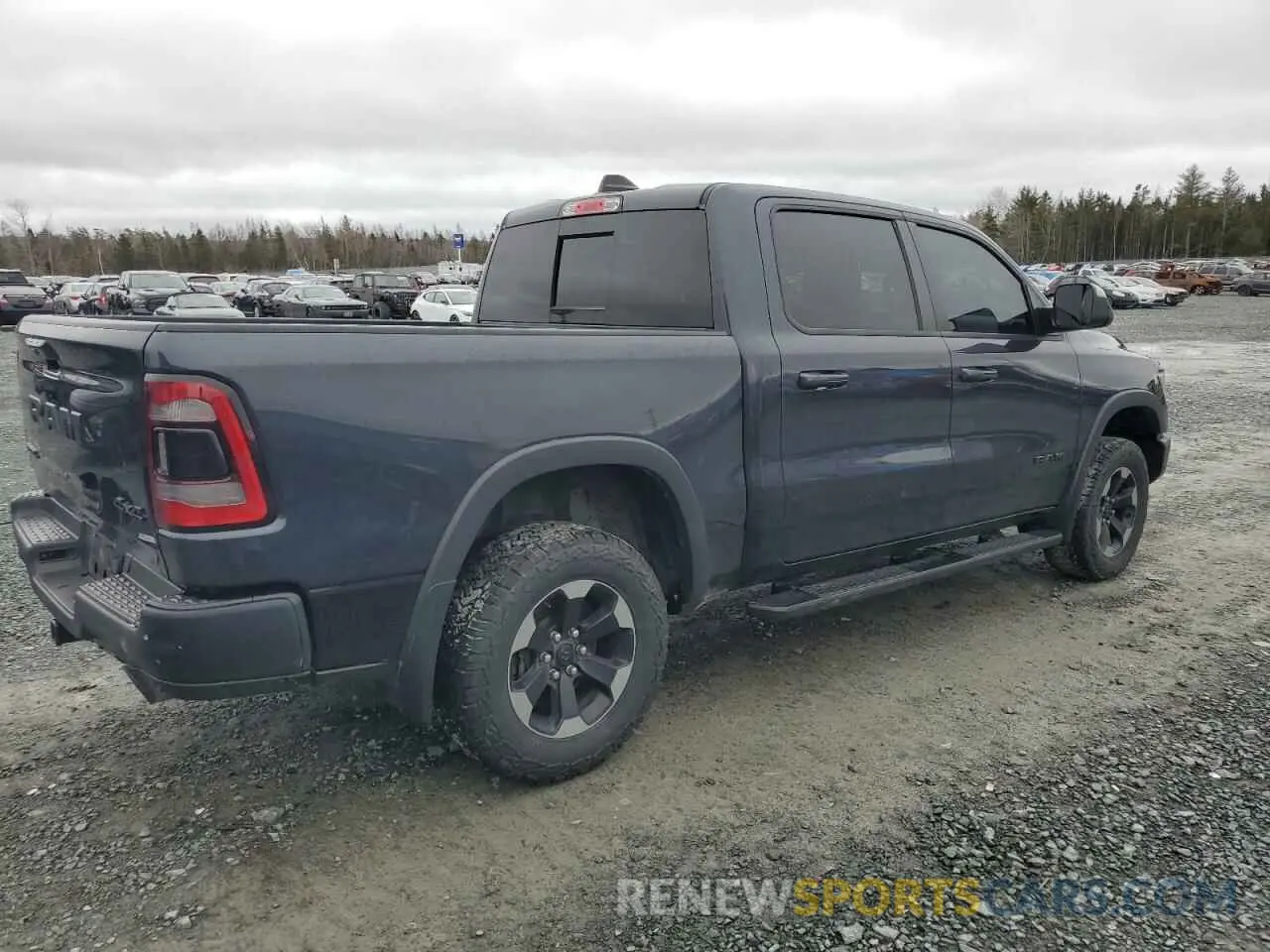 3 Photograph of a damaged car 1C6SRFLT1KN582579 RAM 1500 2019