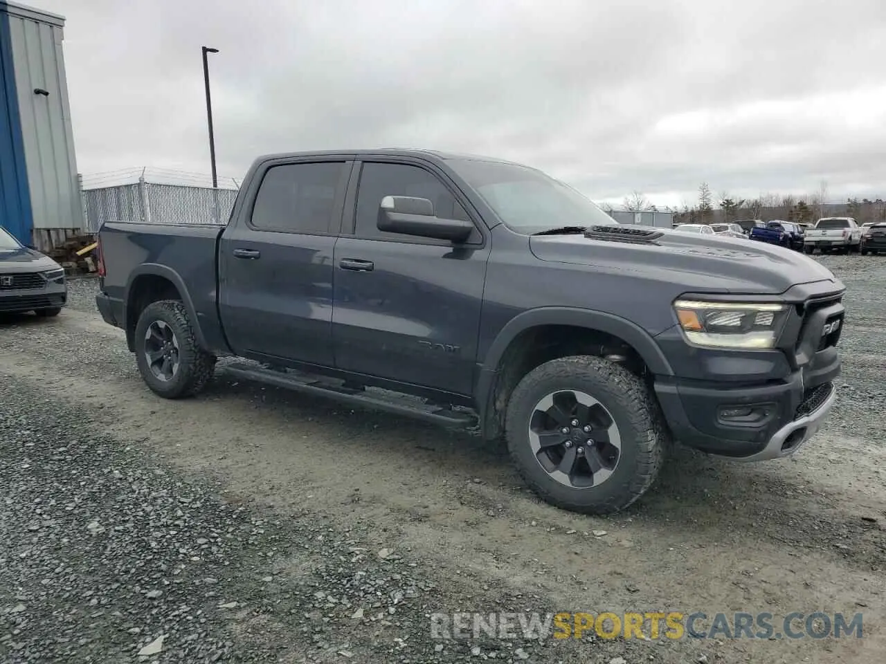 4 Photograph of a damaged car 1C6SRFLT1KN582579 RAM 1500 2019