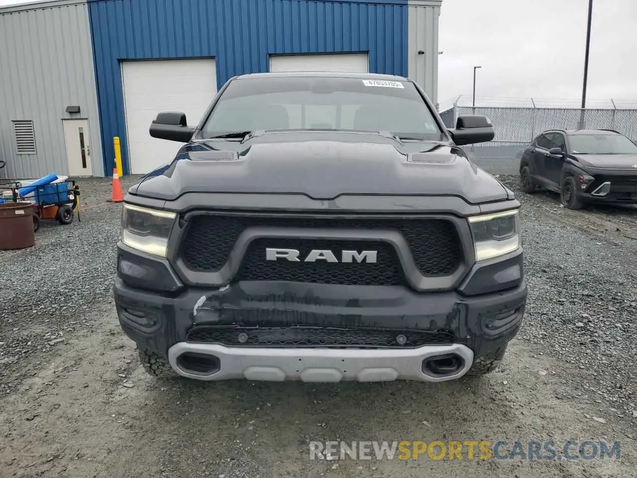 5 Photograph of a damaged car 1C6SRFLT1KN582579 RAM 1500 2019