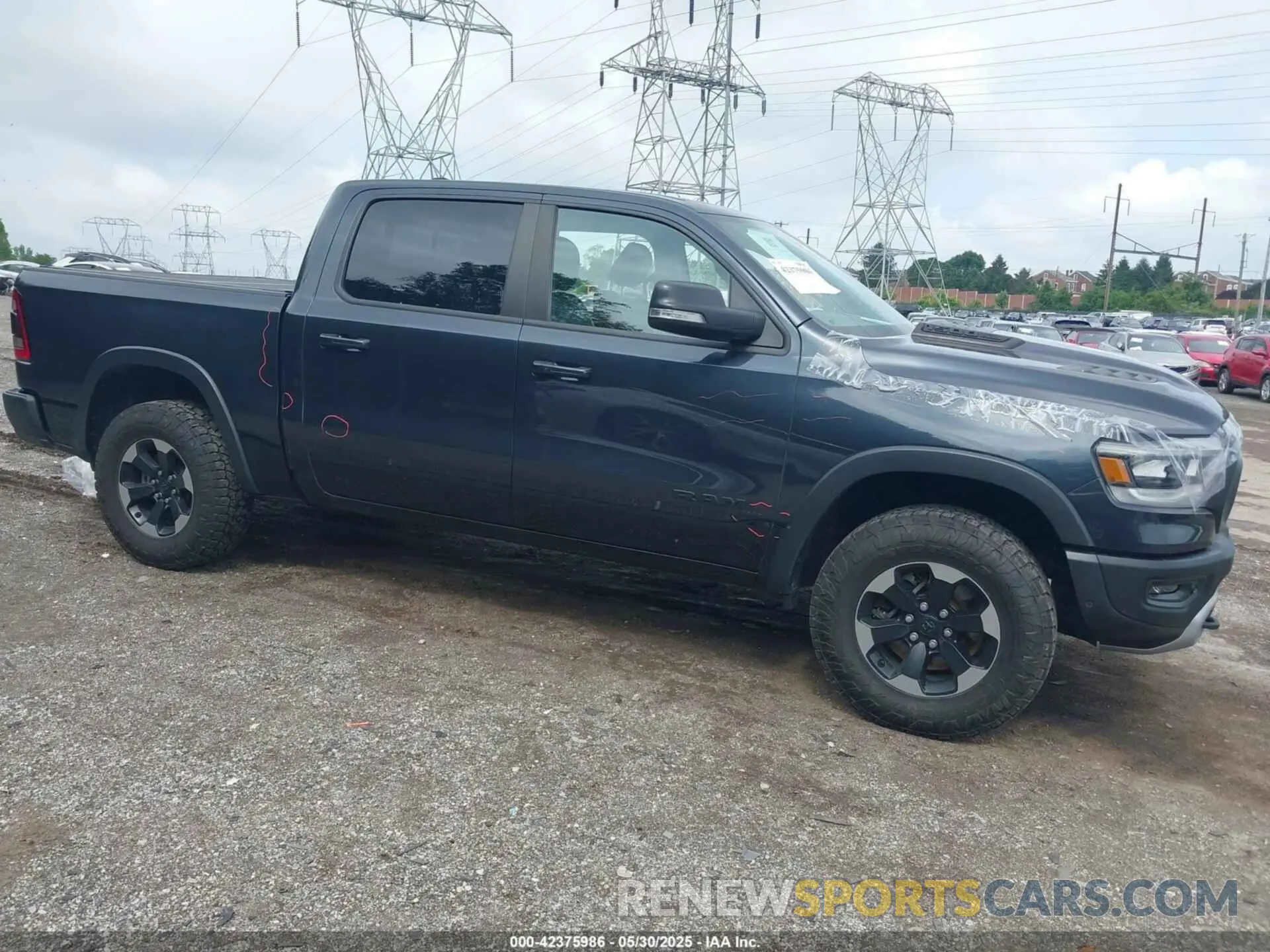1 Photograph of a damaged car 1C6SRFLT1KN784936 RAM 1500 2019