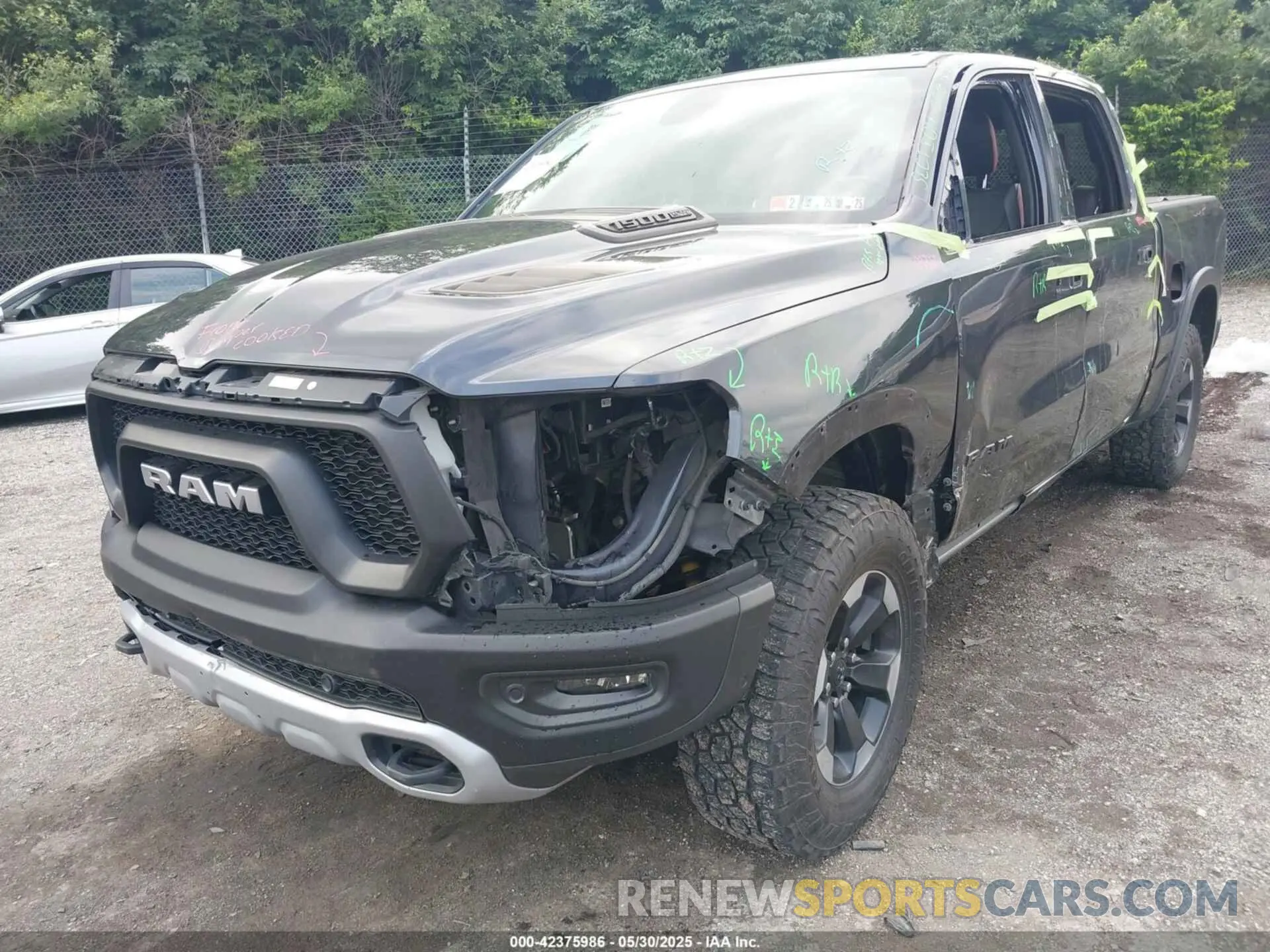 6 Photograph of a damaged car 1C6SRFLT1KN784936 RAM 1500 2019