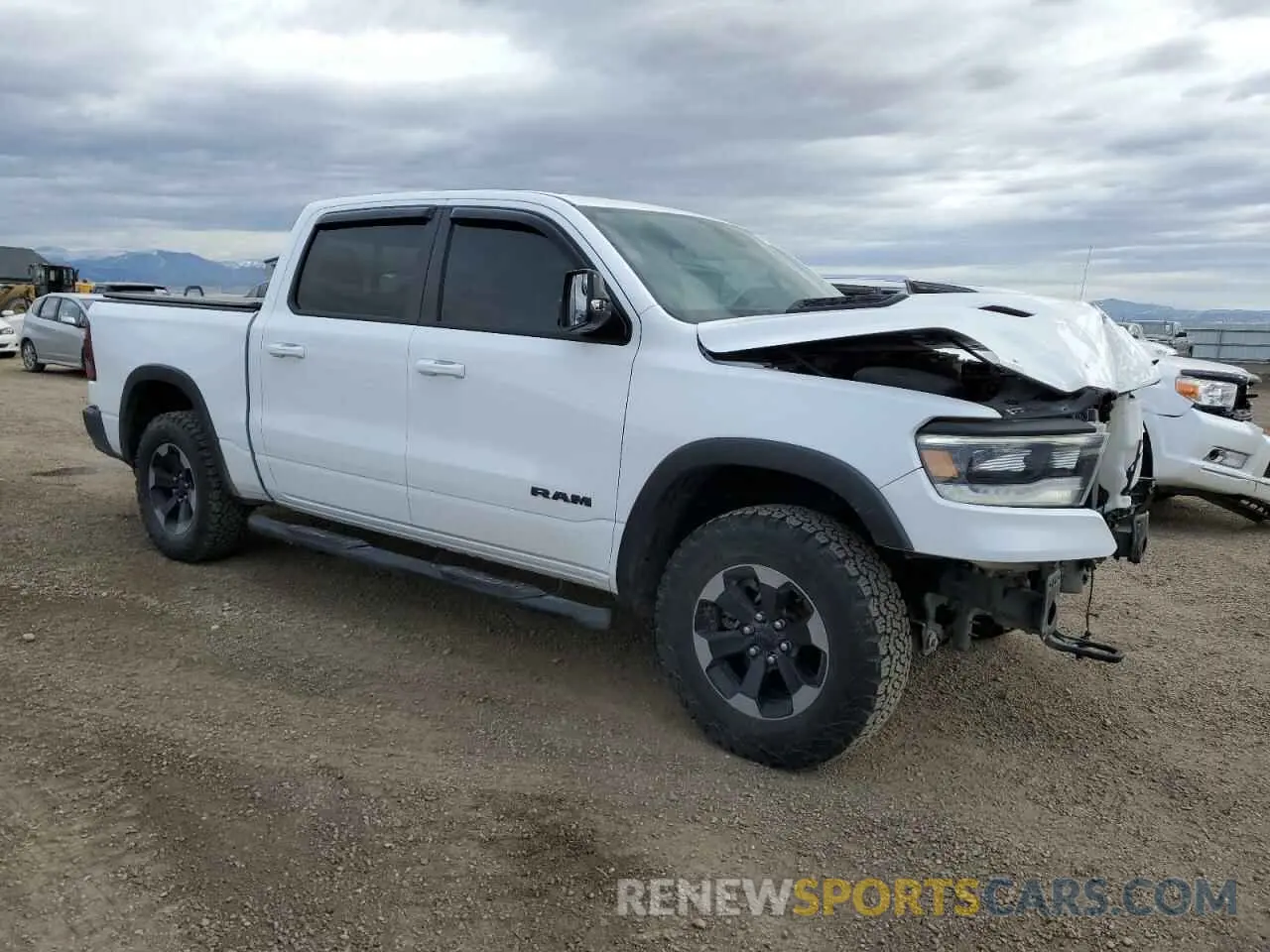 4 Photograph of a damaged car 1C6SRFLT1KN897382 RAM 1500 2019