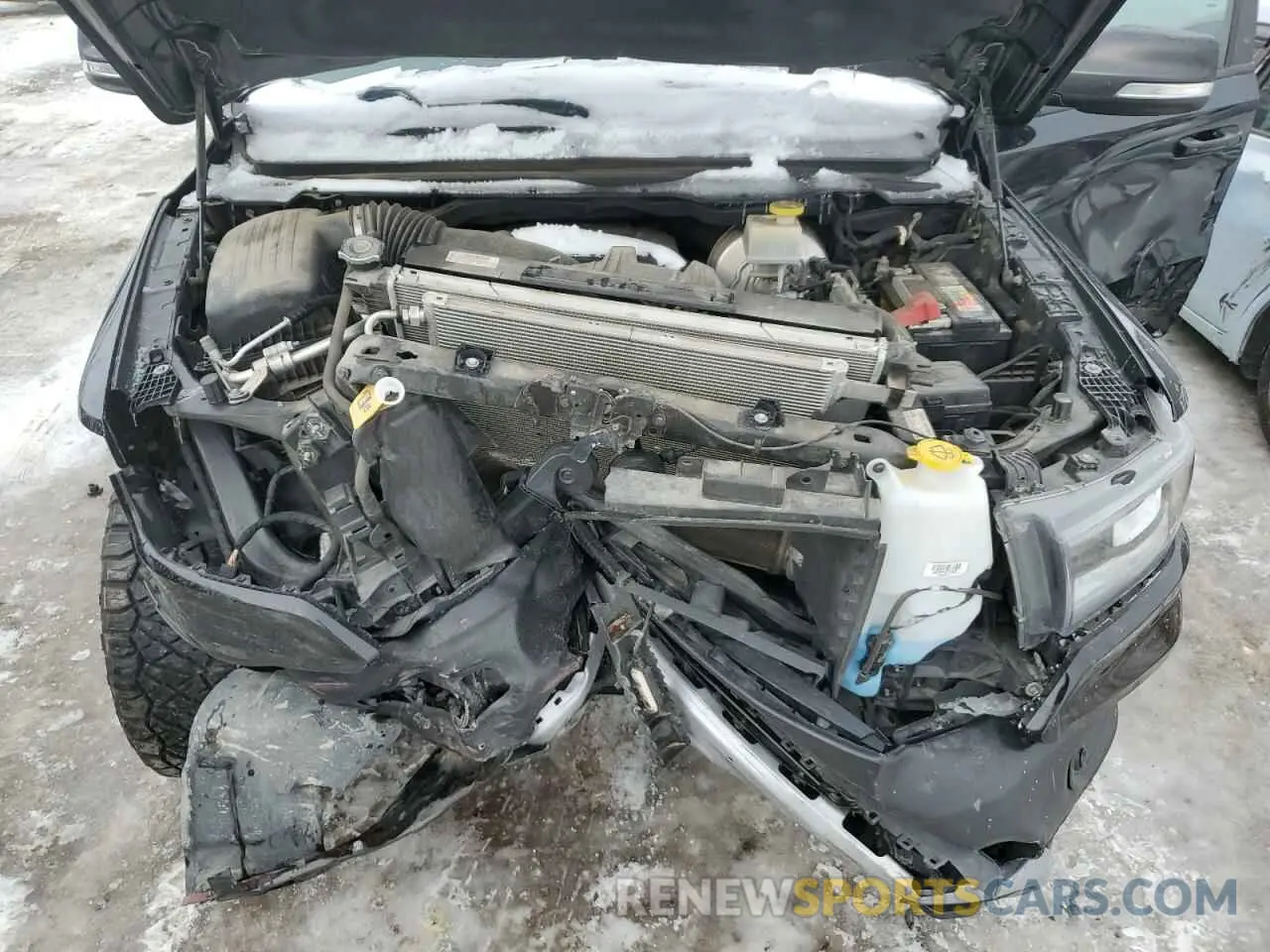 11 Photograph of a damaged car 1C6SRFLT1KN915220 RAM 1500 2019