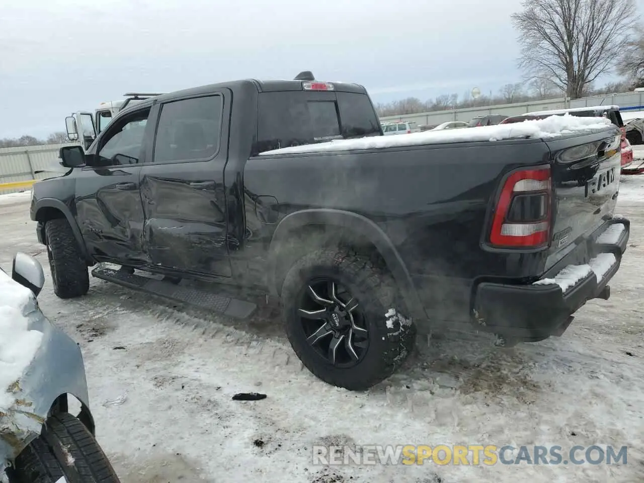 2 Photograph of a damaged car 1C6SRFLT1KN915220 RAM 1500 2019