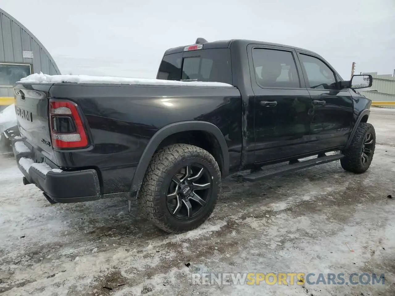 3 Photograph of a damaged car 1C6SRFLT1KN915220 RAM 1500 2019