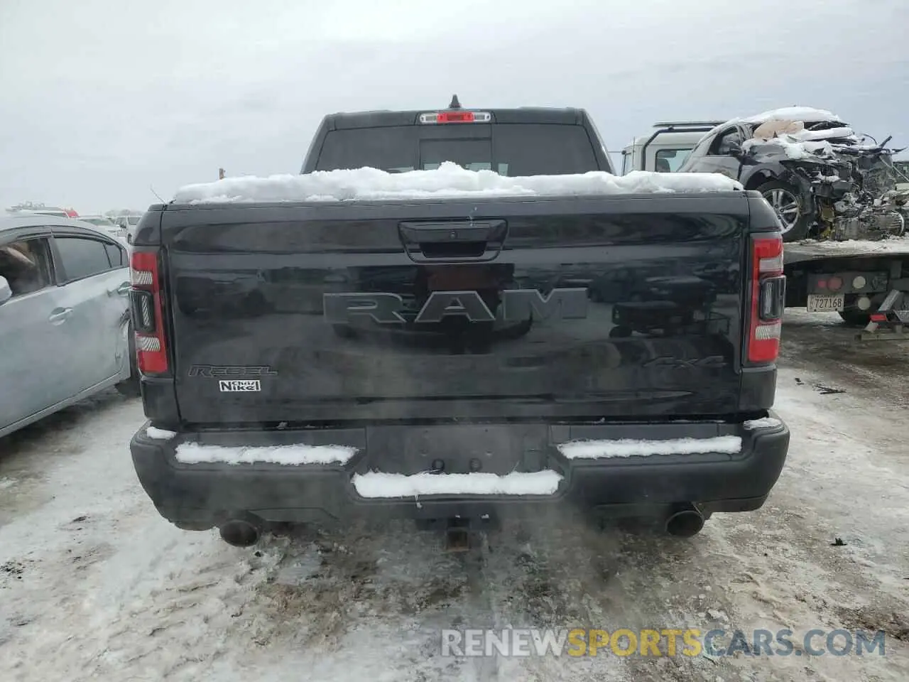 6 Photograph of a damaged car 1C6SRFLT1KN915220 RAM 1500 2019