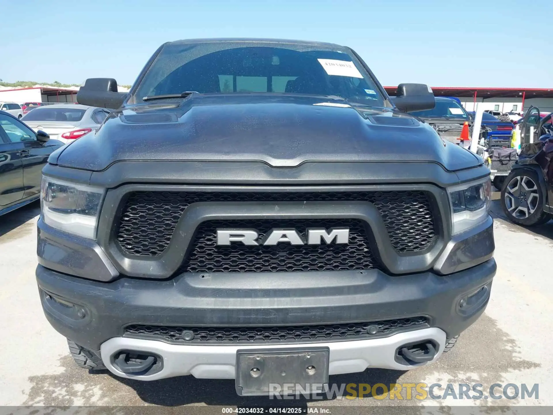 12 Photograph of a damaged car 1C6SRFLT2KN661792 RAM 1500 2019