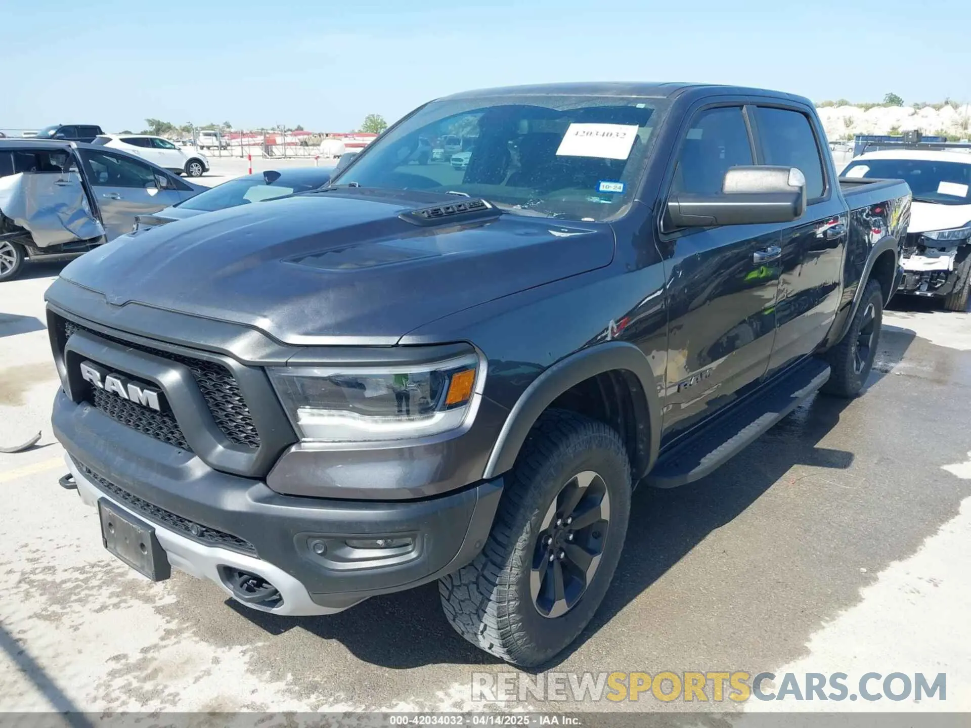 2 Photograph of a damaged car 1C6SRFLT2KN661792 RAM 1500 2019