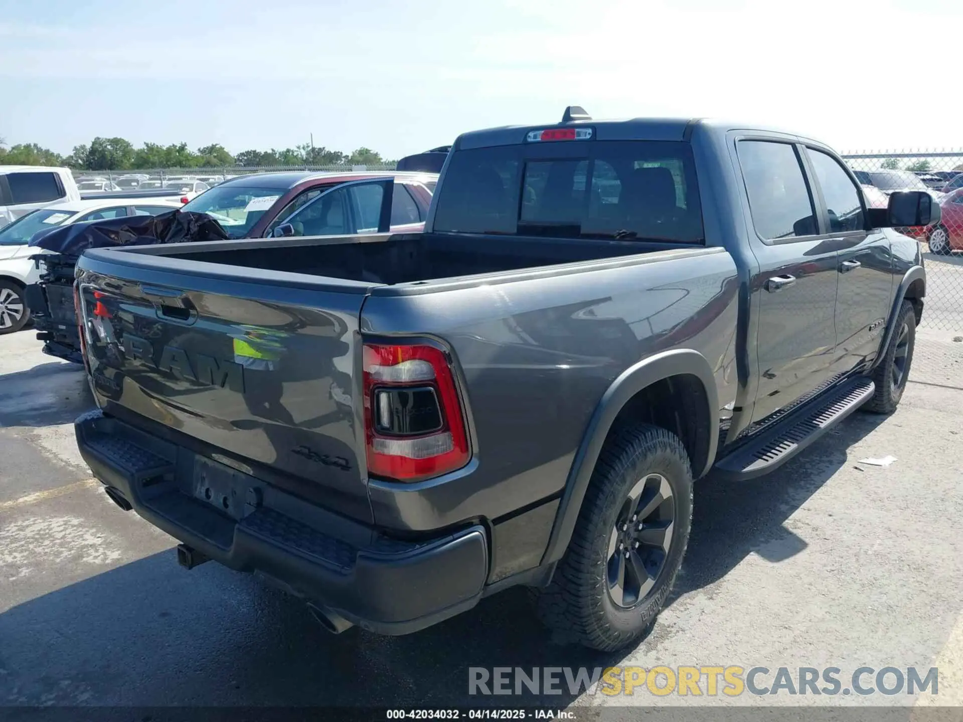 4 Photograph of a damaged car 1C6SRFLT2KN661792 RAM 1500 2019