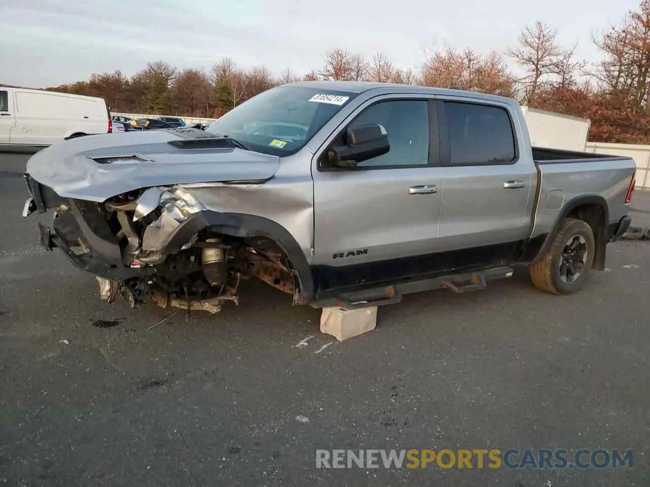 1 Photograph of a damaged car 1C6SRFLT2KN698535 RAM 1500 2019