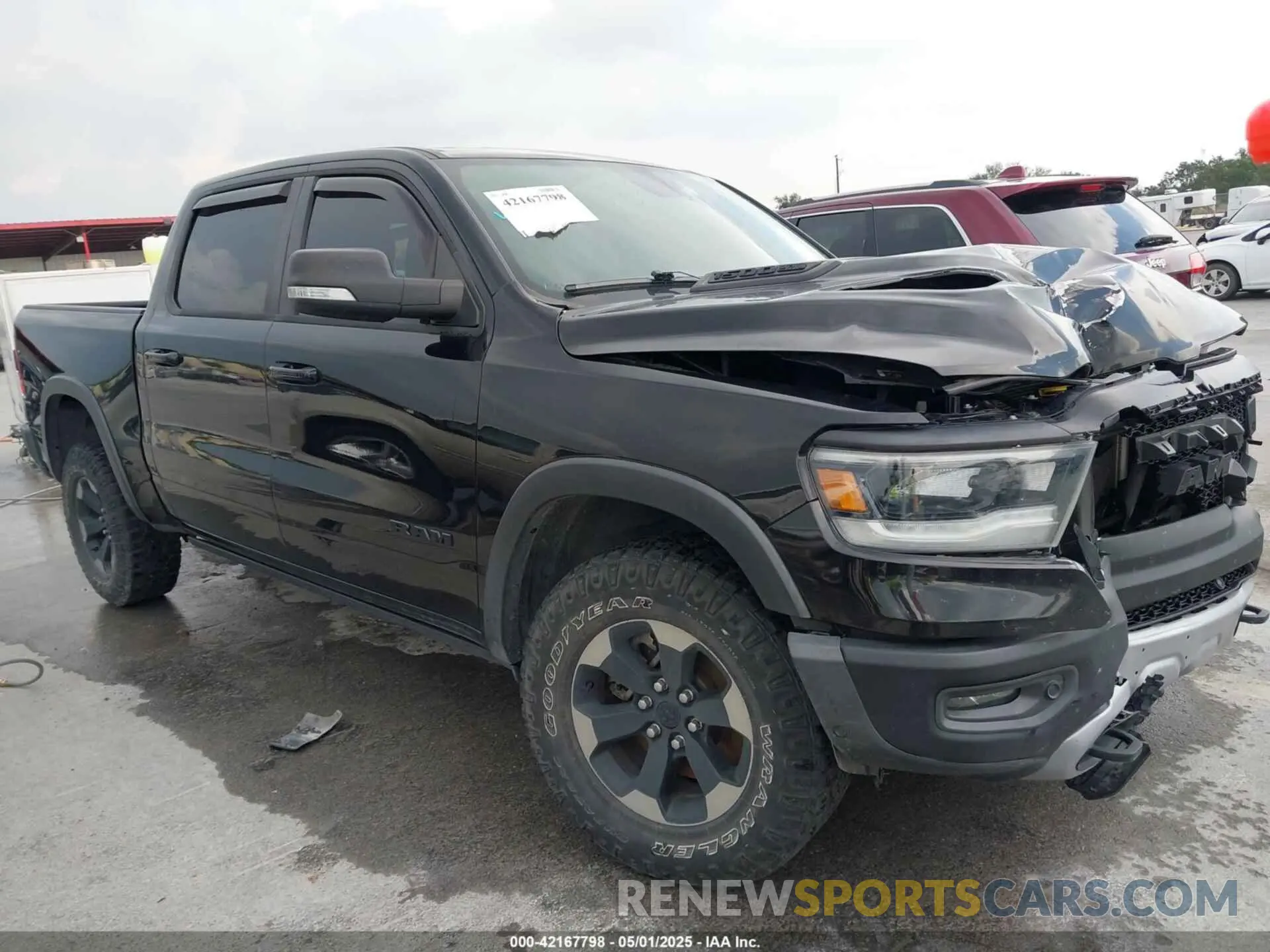 1 Photograph of a damaged car 1C6SRFLT2KN914674 RAM 1500 2019