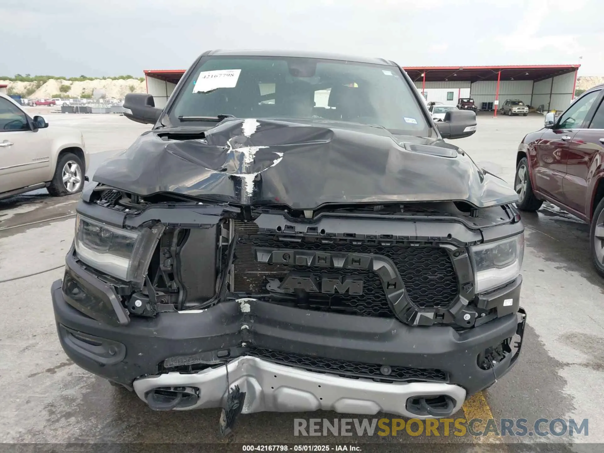 12 Photograph of a damaged car 1C6SRFLT2KN914674 RAM 1500 2019