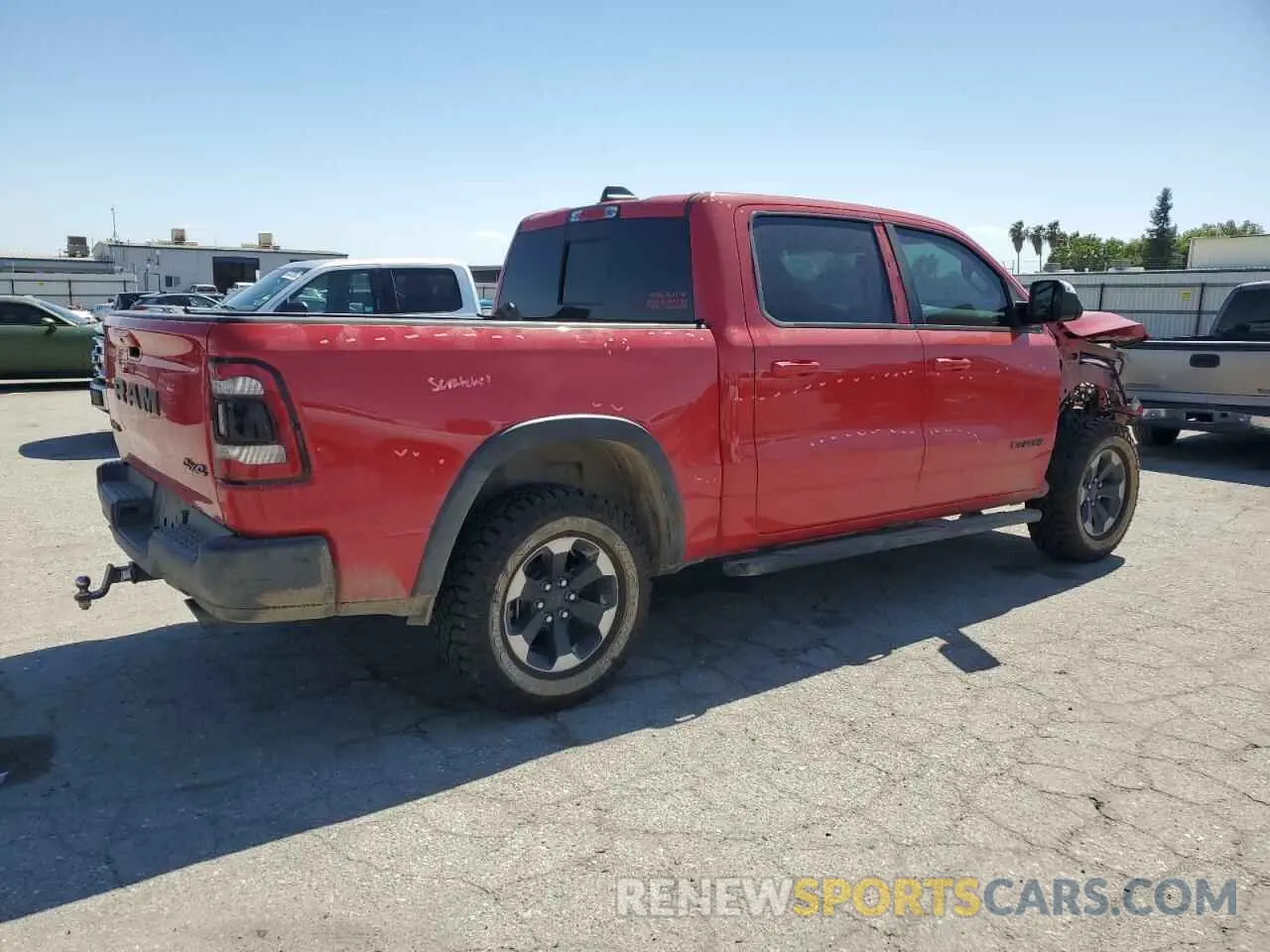 3 Photograph of a damaged car 1C6SRFLT3KN618482 RAM 1500 2019