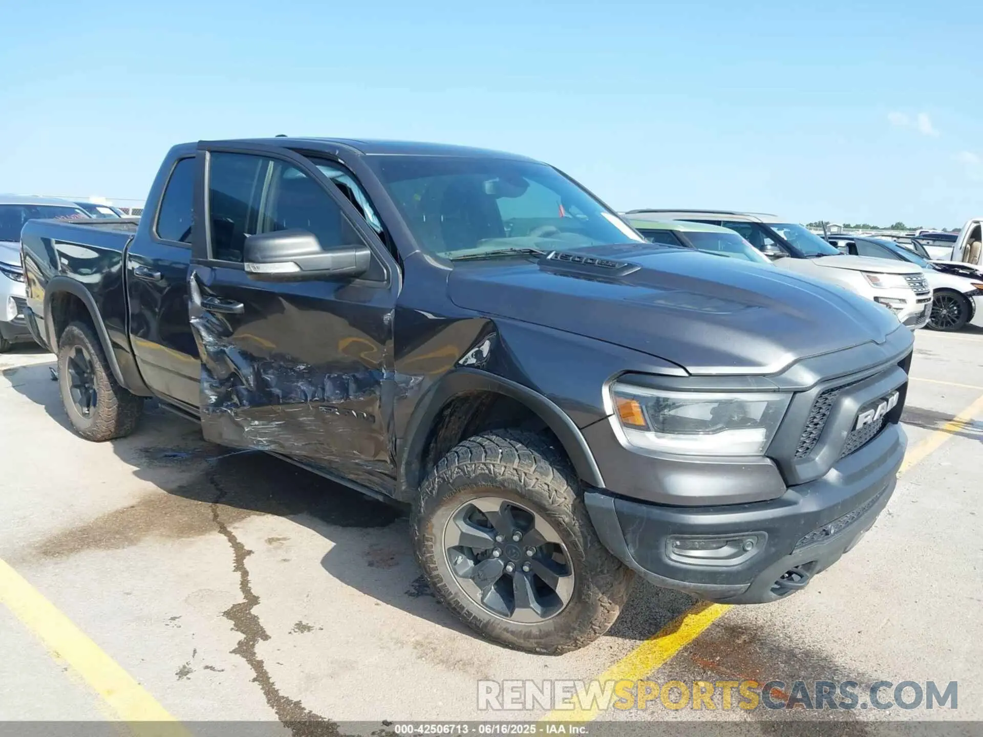 1 Photograph of a damaged car 1C6SRFLT4KN698648 RAM 1500 2019