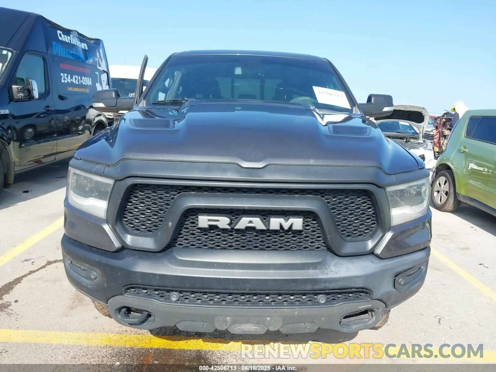 12 Photograph of a damaged car 1C6SRFLT4KN698648 RAM 1500 2019