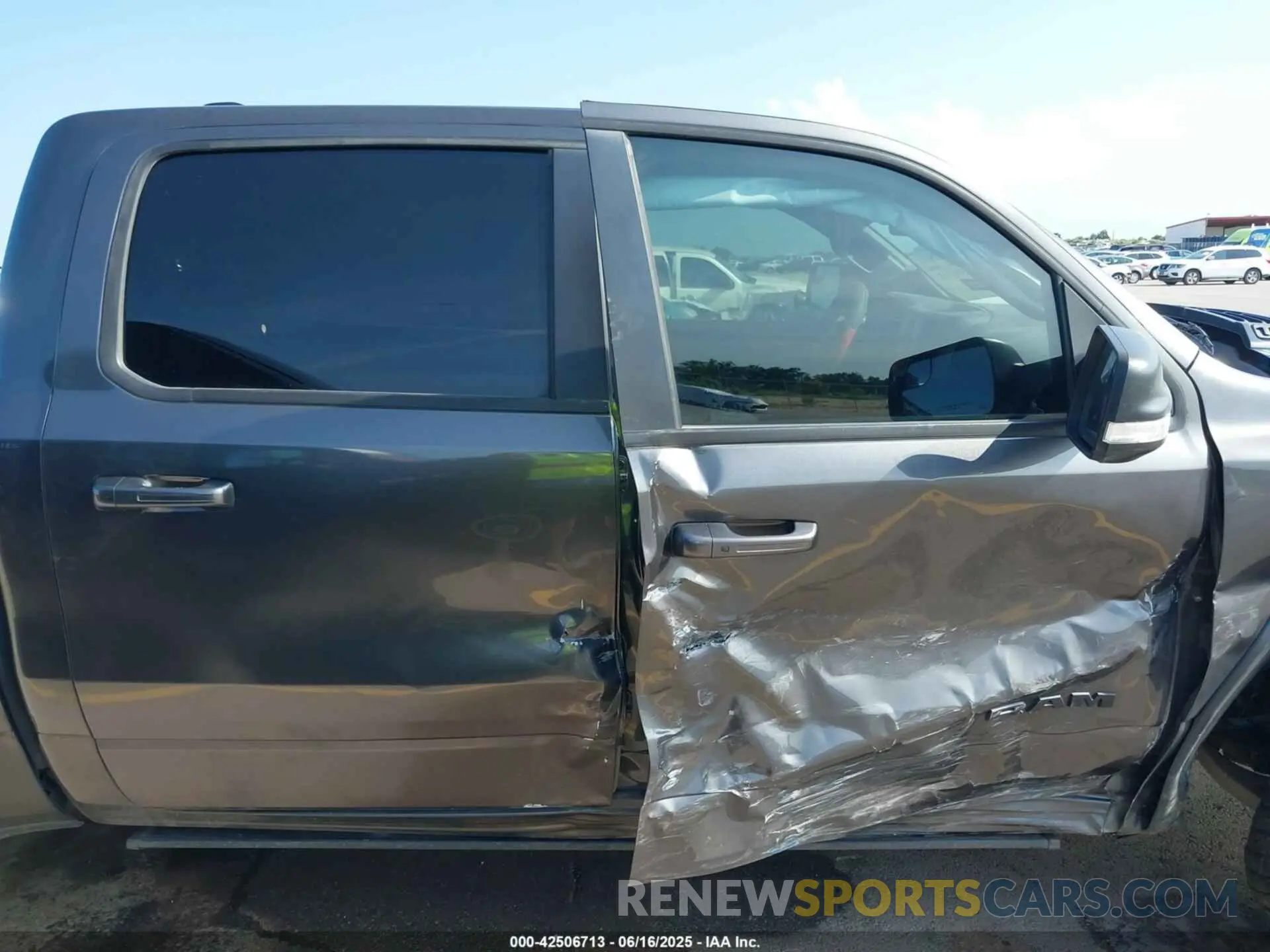 13 Photograph of a damaged car 1C6SRFLT4KN698648 RAM 1500 2019