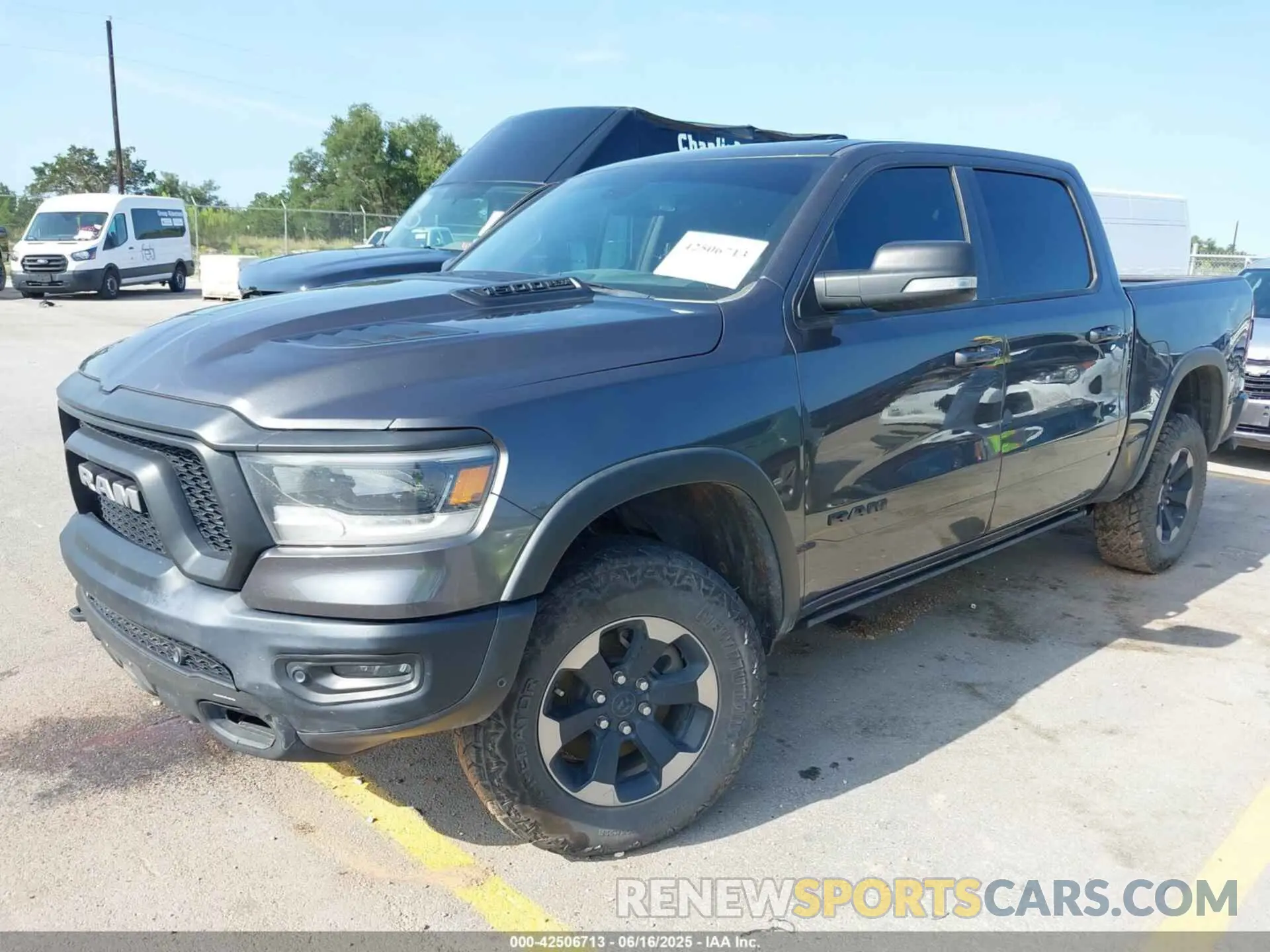 2 Photograph of a damaged car 1C6SRFLT4KN698648 RAM 1500 2019