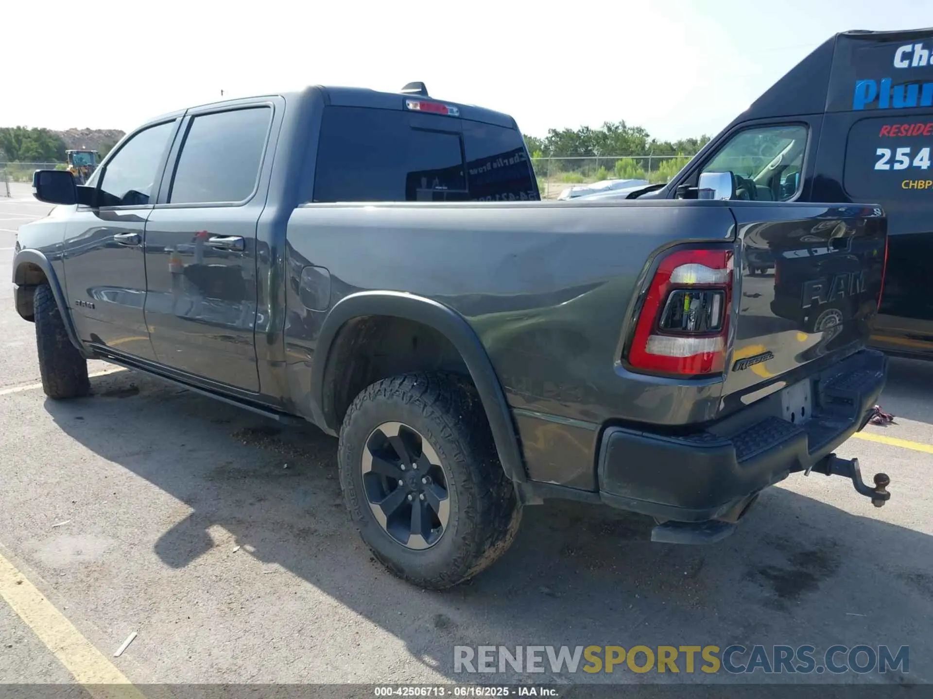 3 Photograph of a damaged car 1C6SRFLT4KN698648 RAM 1500 2019