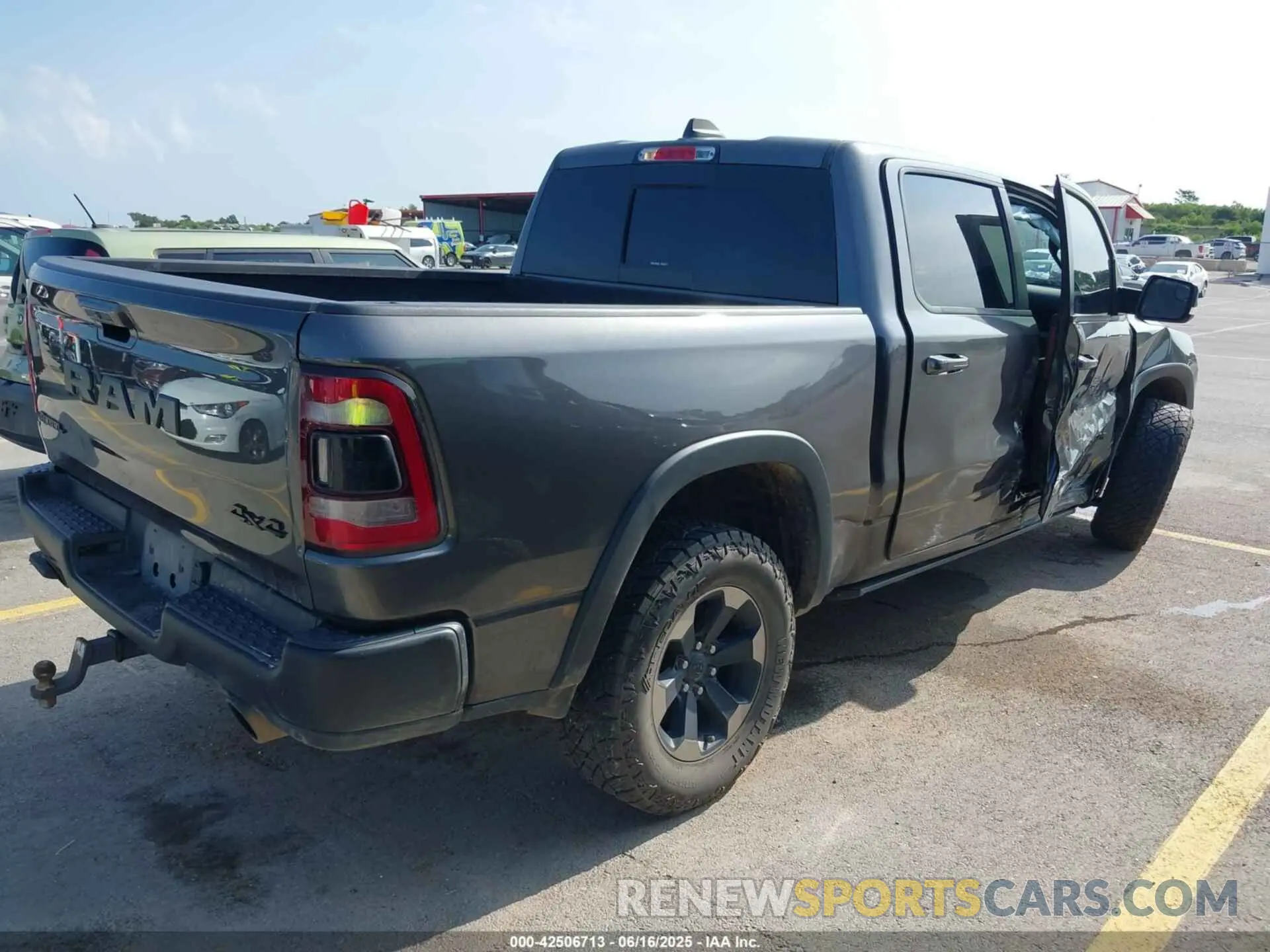 4 Photograph of a damaged car 1C6SRFLT4KN698648 RAM 1500 2019