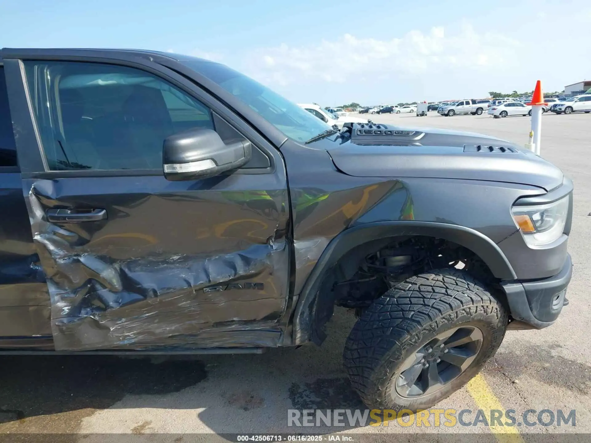 6 Photograph of a damaged car 1C6SRFLT4KN698648 RAM 1500 2019