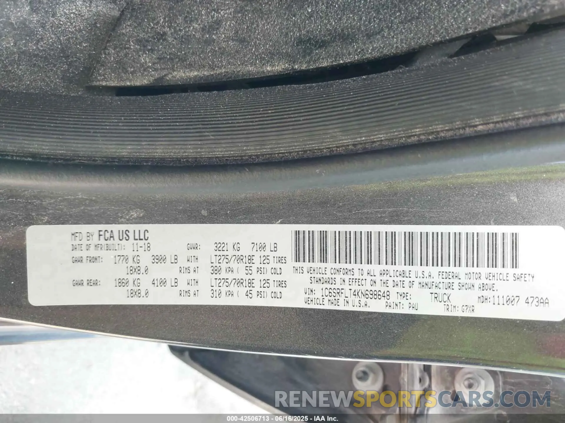 9 Photograph of a damaged car 1C6SRFLT4KN698648 RAM 1500 2019