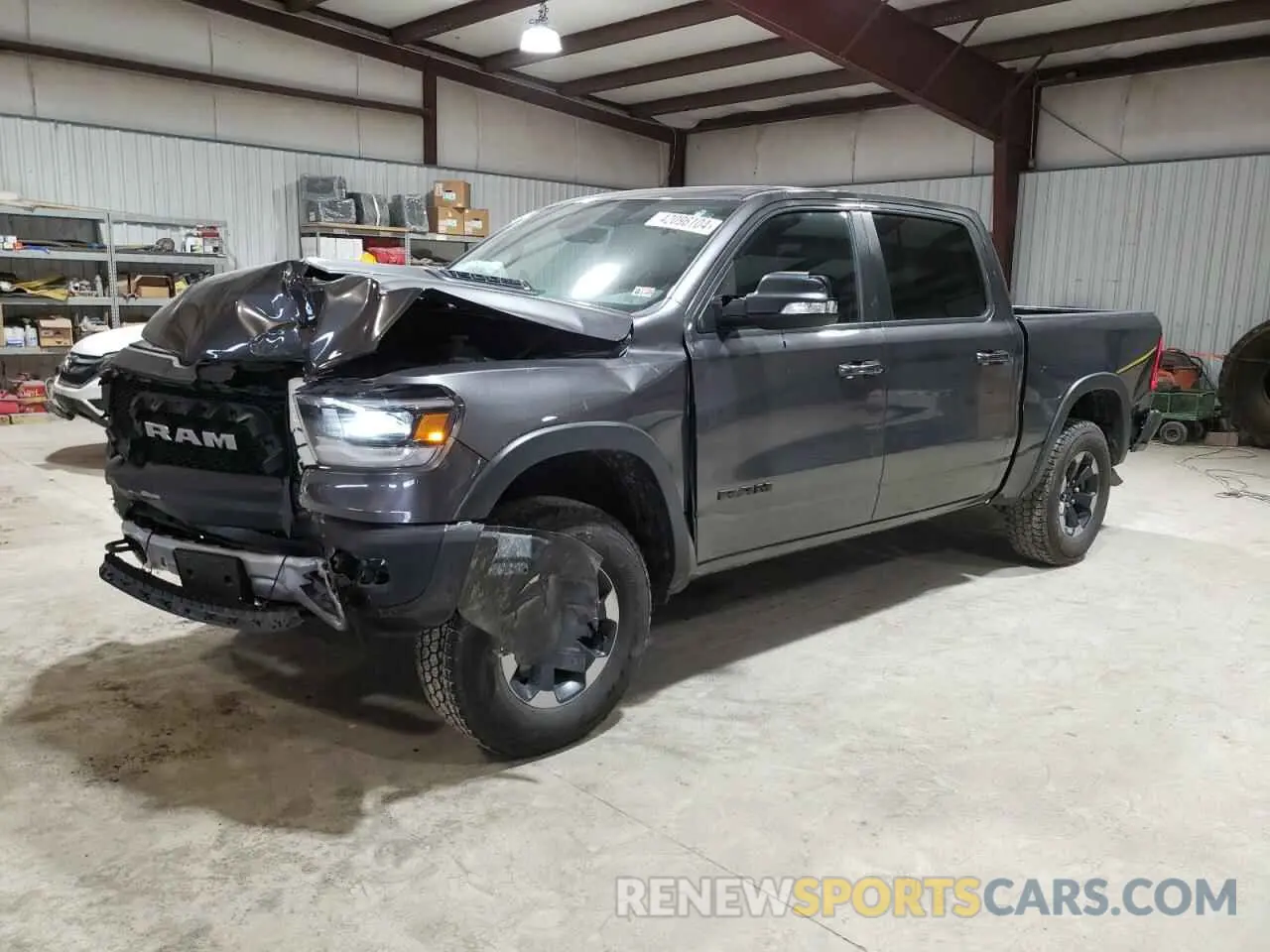 1 Photograph of a damaged car 1C6SRFLT4KN874338 RAM 1500 2019